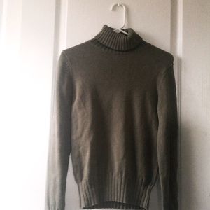 Green turtleneck sweater